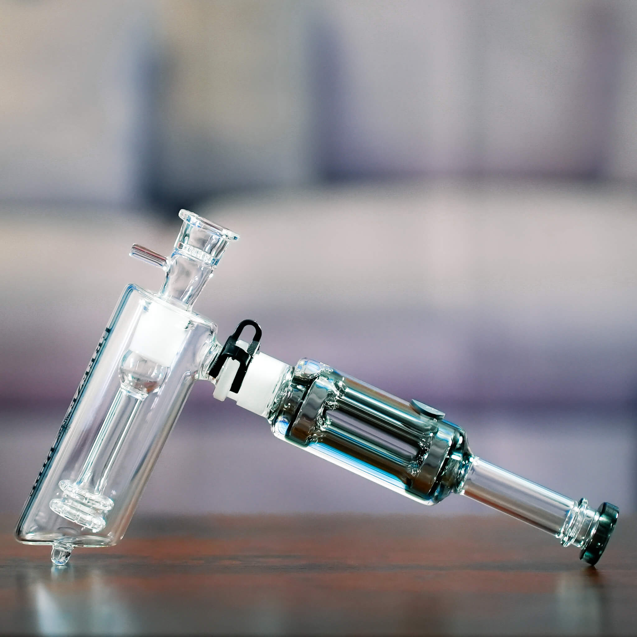 glass bubbler pipe on table